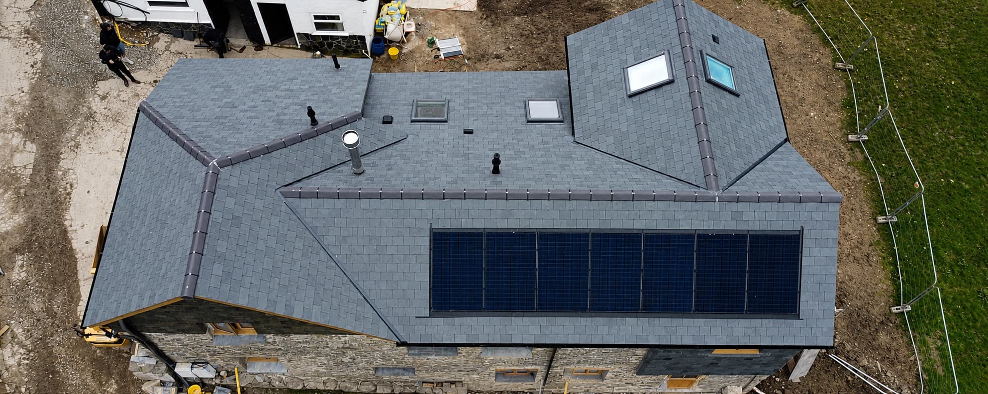 Freshly laid Cornish slate roof tiles in bright sunlight